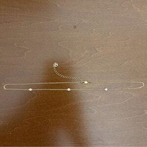 mejuri satellite choker station necklace with three bezel white sapphires 18k ve